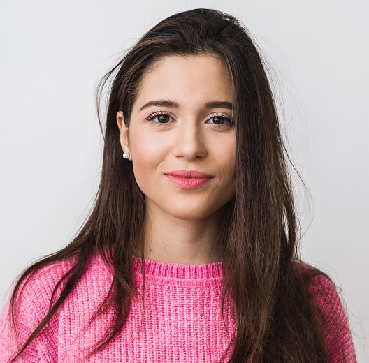 girl in pink sweater